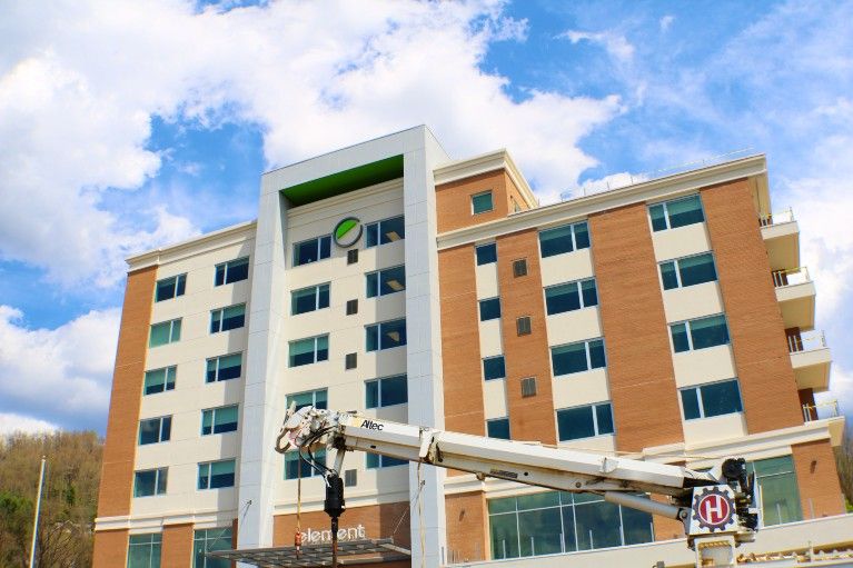 Asheville hotel construction: the Element hotel with a crane in front